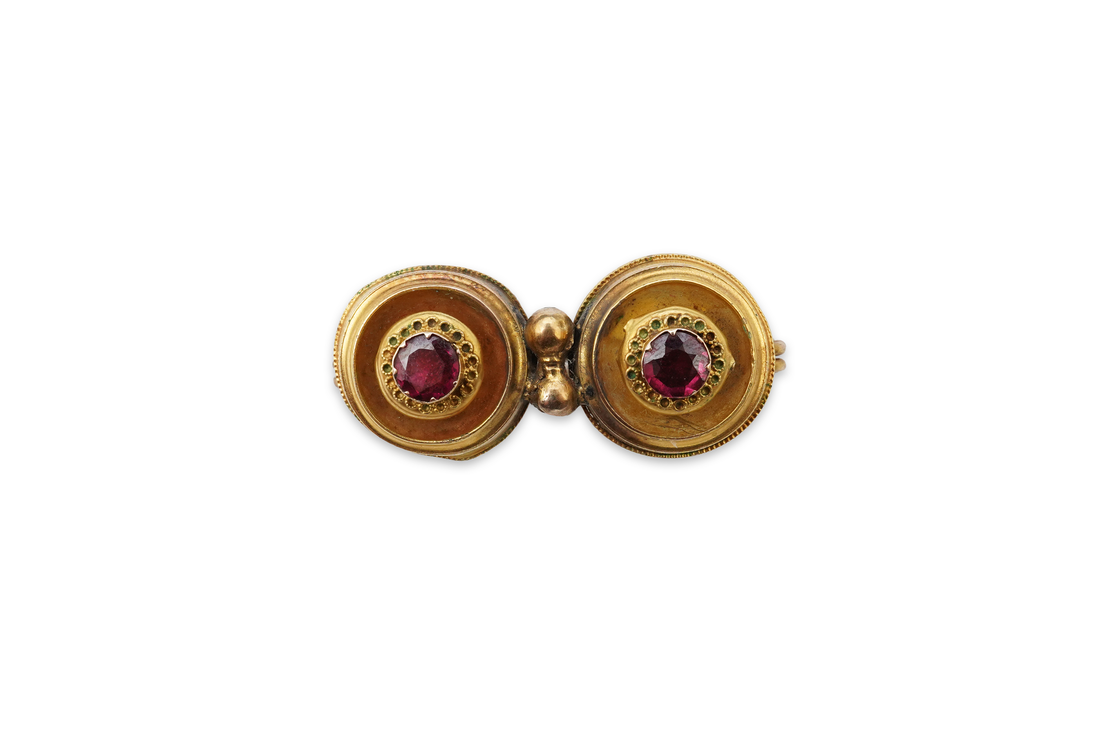 A Victorian ruby and gold double target brooch, late 19th century and later, composed of two roundels set with circular-cut garnets, with wirework details, length 3.7cm, gross weight approximately 3.5 grams